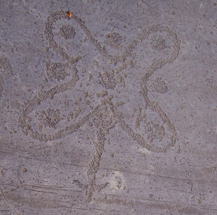 The Camunian rose petroglyph carved at Foppe di Nadro, Val Camonica, Italy